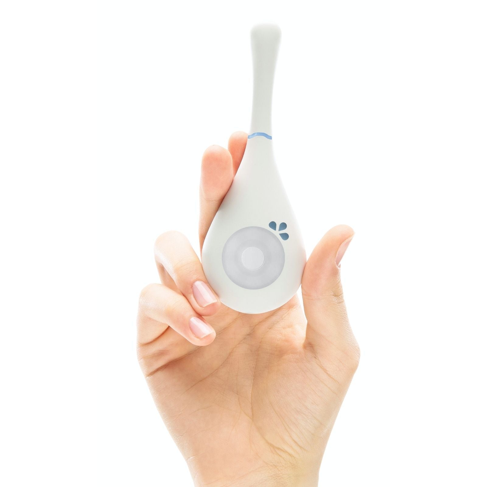 Hand holding Daysy fertility tracker device against white background