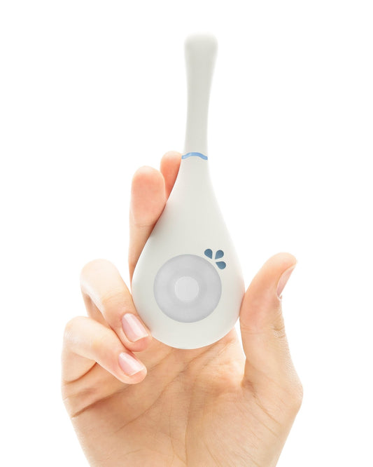 Close-up of Daysy fertility tracker device on neutral background